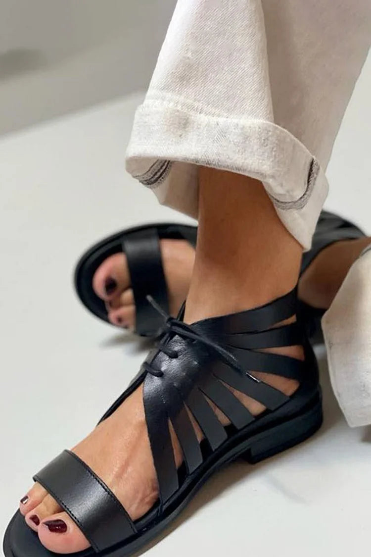 Schwarze einfarbige Sandalen mit runder Ausschnittspitze
