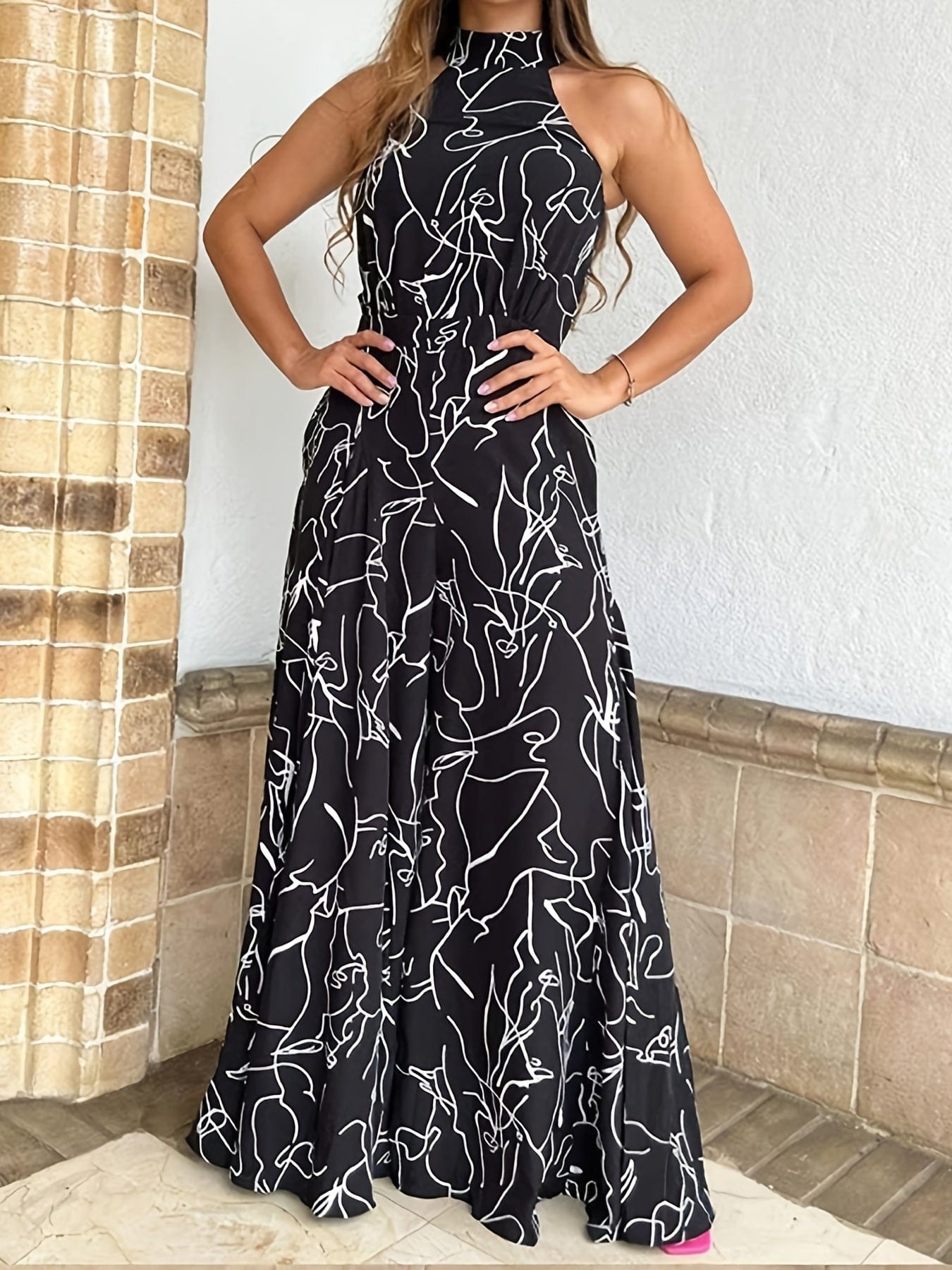 Lässiger bedruckter Halter-Ärmelloser Jumpsuit mit hohem Taillenansatz und weitem Bein